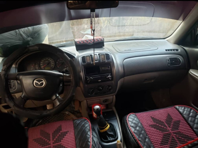 Madza 323, Voitures, Conakry