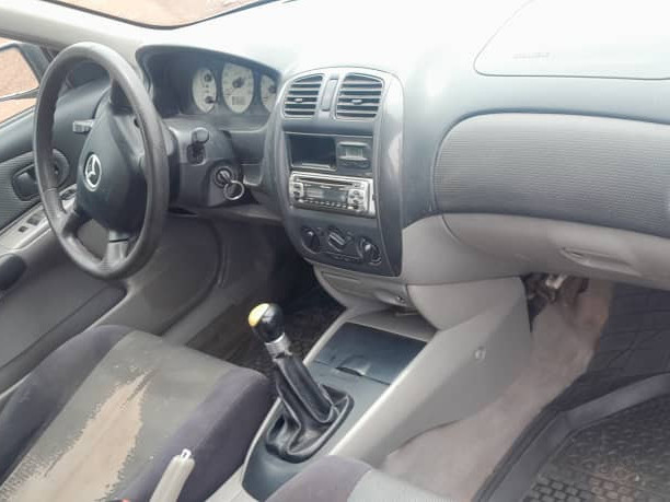 Madza 323, Voitures, Conakry