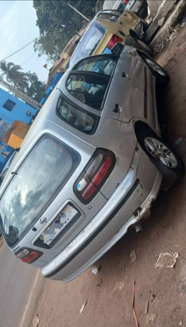 NISSAN ALMERA AUTOMATIQUE ESSENCES CLIMATISÉE, Voitures, Conakry